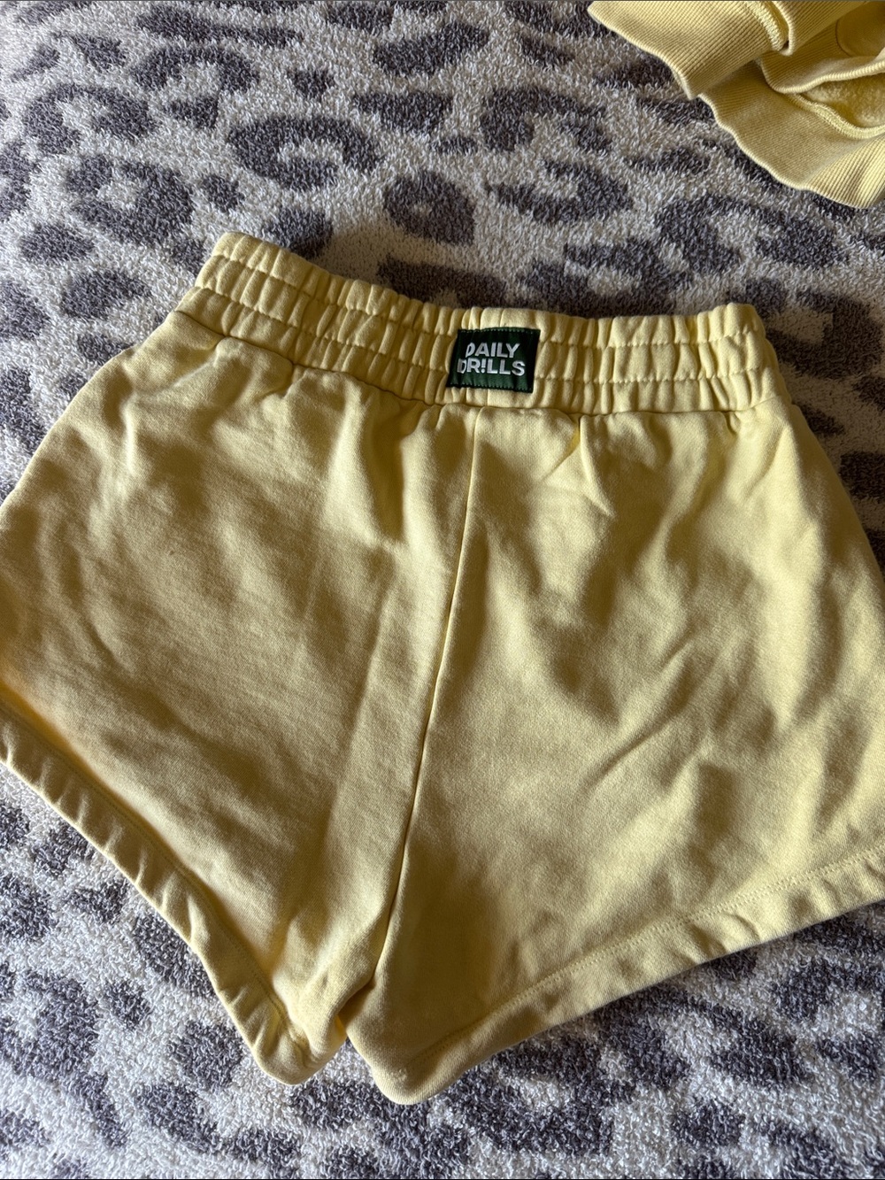 Daily Drills Women's Pale Yellow Ribbed Waist Athletic Shorts